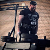 RELENTLESS BEASTS 'Strongman Mentality' Bodybuilding & Strongman Gym Wear Black T-Shirt in Action